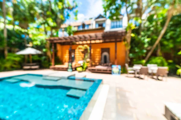 Seyahat ve tatil için güzel otel resort ve yüzme havuzu arka plan bulanıklık