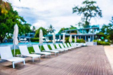 Soyut bulanıklık ve ufuk güzel açık yüzme havuzunda otel ve tatil arka planı için