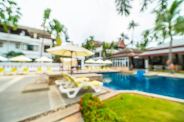 Seyahat ve tatil için güzel otel resort ve yüzme havuzu arka plan bulanıklık