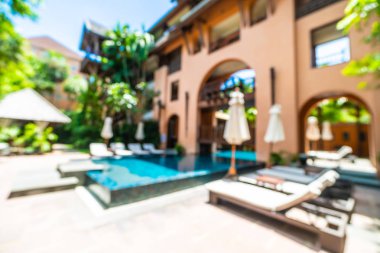 Seyahat ve tatil için güzel otel resort ve yüzme havuzu arka plan bulanıklık