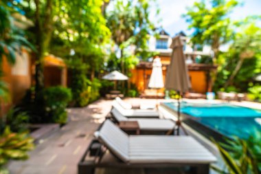 Seyahat ve tatil için güzel otel resort ve yüzme havuzu arka plan bulanıklık