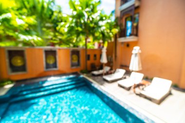 Seyahat ve tatil için güzel otel resort ve yüzme havuzu arka plan bulanıklık