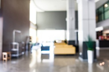 Özet olarak, arka plan için soyut bulanık ve odaksız otel ve lobi iç mekanı