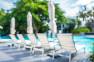 Soyut bulanıklık ve ufuk güzel açık yüzme havuzunda otel ve tatil arka planı için