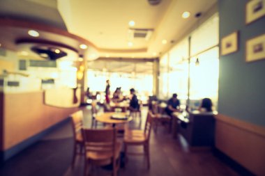 Arka plan için soyut bulanık restoran ve kafenin içi