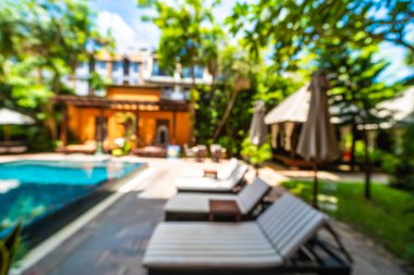 Seyahat ve tatil için güzel otel resort ve yüzme havuzu arka plan bulanıklık