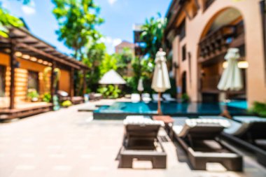 Seyahat ve tatil için güzel otel resort ve yüzme havuzu arka plan bulanıklık