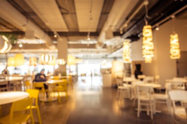 Arka plan için soyut bulanıklık ve odaklanmış kahve dükkanı ve restoran iç mekanı