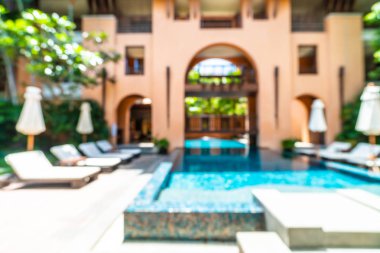Seyahat ve tatil için güzel otel resort ve yüzme havuzu arka plan bulanıklık