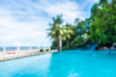 Soyut bulanıklık ve ufuk güzel açık yüzme havuzunda otel ve tatil arka planı için