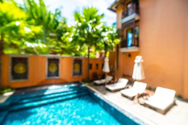 Seyahat ve tatil için güzel otel resort ve yüzme havuzu arka plan bulanıklık