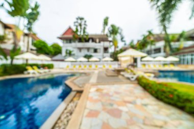 Seyahat ve tatil için güzel otel resort ve yüzme havuzu arka plan bulanıklık