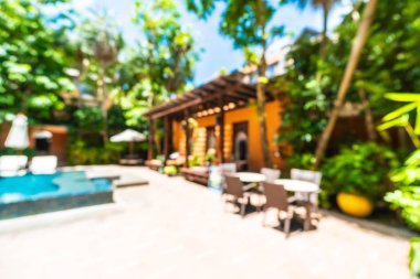 Seyahat ve tatil için güzel otel resort ve yüzme havuzu arka plan bulanıklık