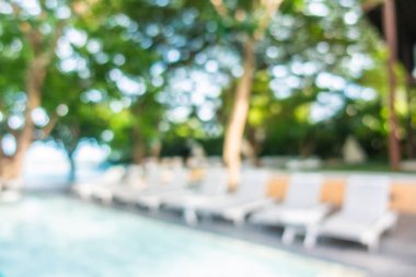 Soyut bulanıklık ve ufuk güzel açık yüzme havuzunda otel ve tatil arka planı için