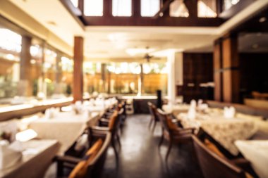 Arka plan için soyut bulanık restoran ve kafenin içi