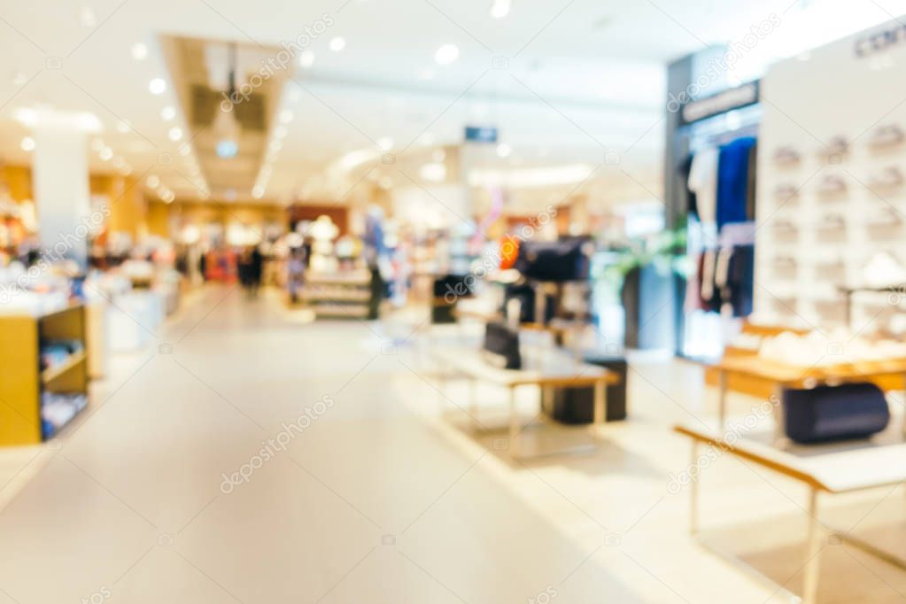 Abstract blur bokeh and defocused shopping mall of department store interior for background