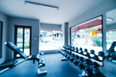 Soyut bulanıklık ve ufuk spor salonu ve fitness ekipmanları iç arka planı için