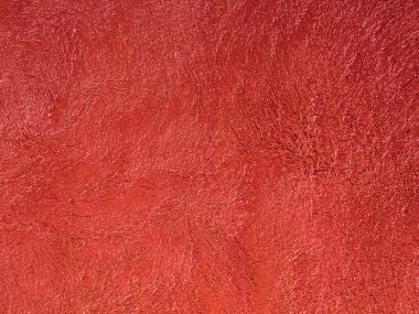 Soyut concreate kırmızı duvar doku ve arka plan için yüzey