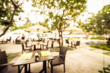 Arka plan için soyut bulanık restoran ve kafenin içi
