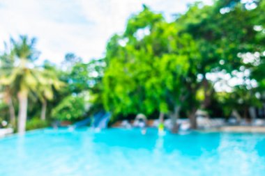 Soyut bulanıklık ve ufuk güzel açık yüzme havuzunda otel ve tatil arka planı için