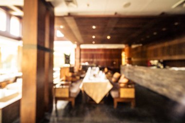 Arka plan için soyut bulanık restoran ve kafenin içi