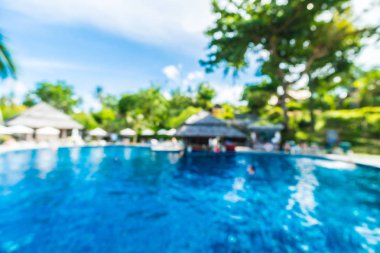 Seyahat ve tatil için güzel otel resort ve yüzme havuzu arka plan bulanıklık