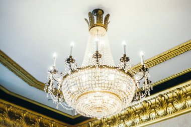 Beautiful luxury chandelier decoration interior of room clipart
