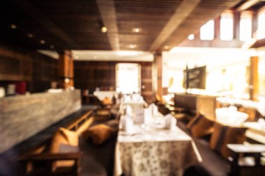 Arka plan için soyut bulanık restoran ve kafenin içi