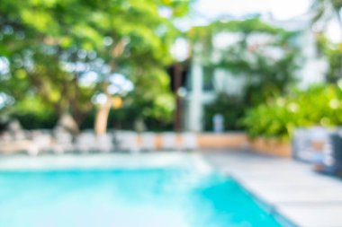 Soyut bulanıklık ve ufuk güzel açık yüzme havuzunda otel ve tatil arka planı için
