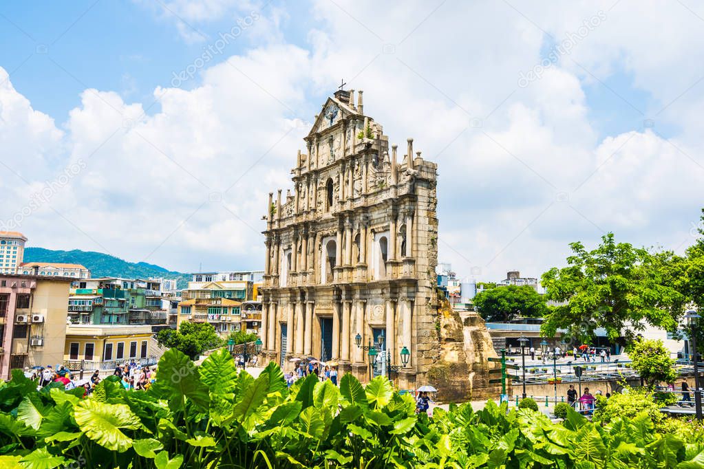 Beautiful old architecture building with ruin of st pual church landmark of macau city with blue sky background