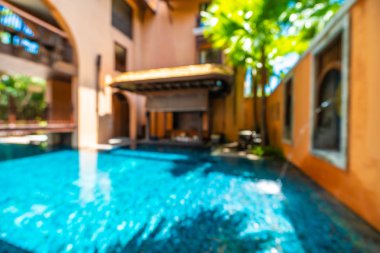 Seyahat ve tatil için güzel otel resort ve yüzme havuzu arka plan bulanıklık