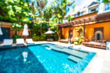 Seyahat ve tatil için güzel otel resort ve yüzme havuzu arka plan bulanıklık