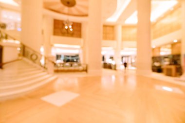 Özet olarak, arka plan için soyut bulanık ve odaksız otel ve lobi iç mekanı