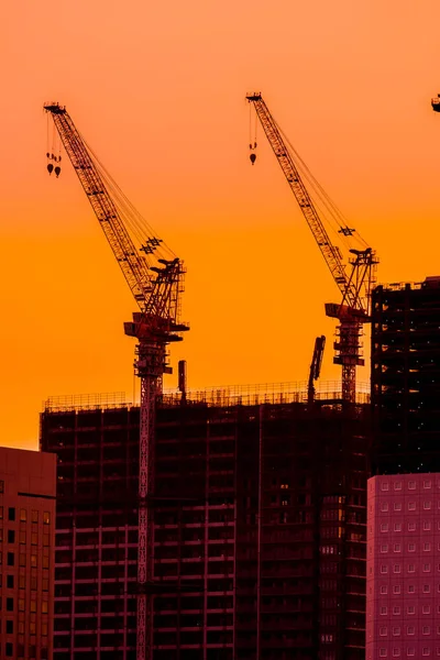 Hermosa Grúa Silhouette Construcción Edificio Atardecer —  Fotos de Stock