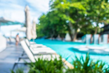 Soyut bulanıklık ve ufuk güzel açık yüzme havuzunda otel ve tatil arka planı için