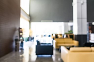 Özet olarak, arka plan için soyut bulanık ve odaksız otel ve lobi iç mekanı