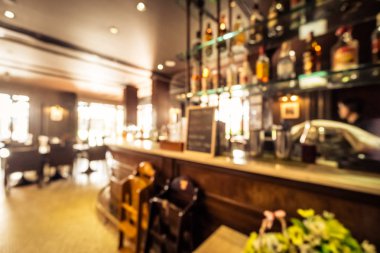 Arka plan için soyut bulanık restoran ve kafenin içi