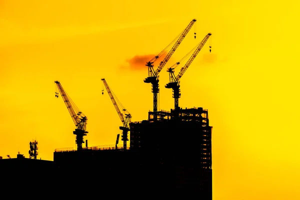 Krásná Silueta Jeřáb Výstavbě Budovy Západu Slunce — Stock fotografie
