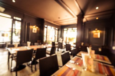 Arka plan için soyut bulanık restoran ve kafenin içi