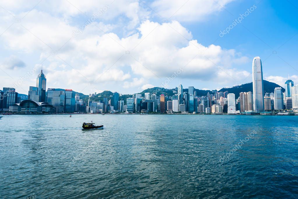 Beautiful architecture building exterior cityscape of hong kong city skyline with blue sky background
