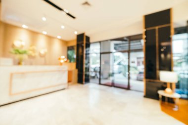Özet olarak, arka plan için soyut bulanık ve odaksız otel ve lobi iç mekanı