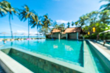 Seyahat ve tatil için güzel otel resort ve yüzme havuzu arka plan bulanıklık