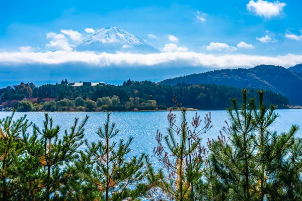 Beautiful landscape of mountain fuji with maple leaf tree around lake in autumn season