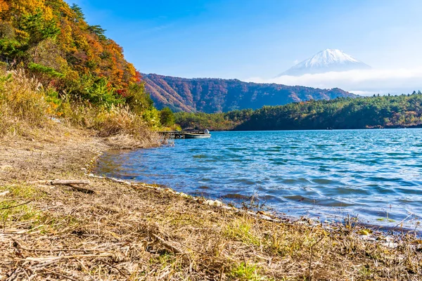 Beautiful landscape of mountain fuji with maple leaf tree around lake in autumn season Yamanashi Japan