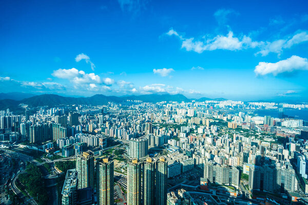 Beautiful architecture building exterior cityscape of hong kong city skyline on blue sky