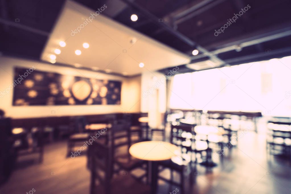 Abstract blur and defocused restaurant and coffee shop cafe interior for background