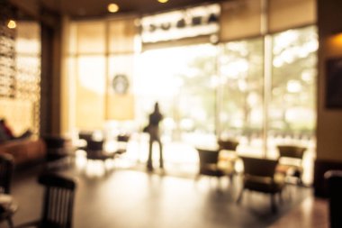 Arka plan için soyut bulanık kahve dükkanı iç mimarisi