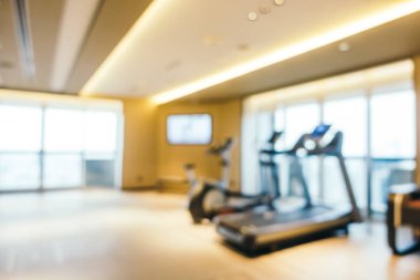 Soyut bulanıklık ve iç arka plan için ufuk spor salonu ve fitness ekipmanları