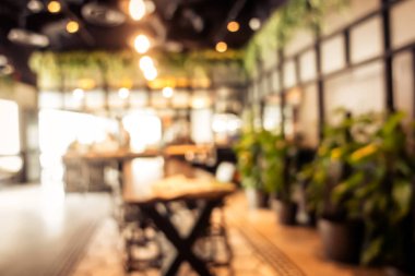 Arka plan için soyut bulanık kahve dükkanı iç mimarisi