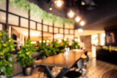 Arka plan için soyut bulanık kahve dükkanı iç mimarisi